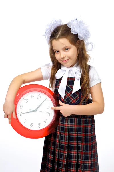 A girl and a clock — Stock Photo, Image