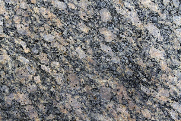 Brokiga granit bakgrund — Stockfoto