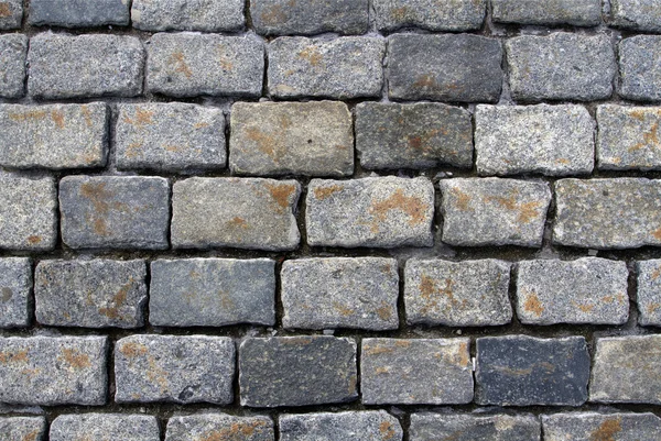 Spotted cobblestone background — Stock Photo, Image