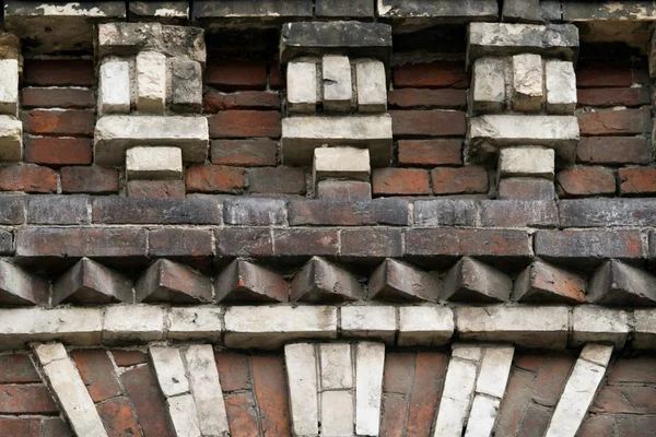 Ornamented old brick wall — Stock Photo, Image