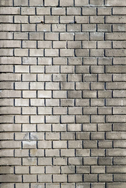 Stará šedá cihlová zeď — Stock fotografie