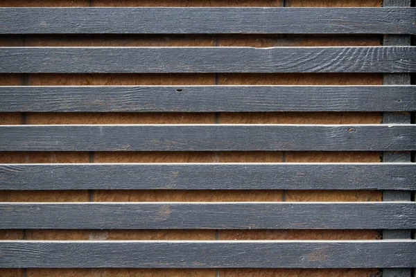 Nástěnné černé dřevěné rošty — Stock fotografie