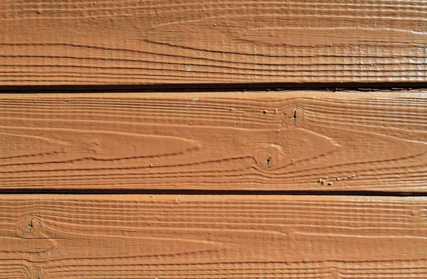 Horizontal brown painted wooden wall — Stock Photo, Image