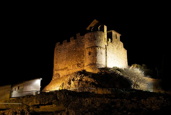 Calafell, Spain. Castle view on night time. Tower.Tourist destination. Old building. Calafell Castle. Medieval age. Tarragona district. Saturated. Castle on night — Stock Photo, Image
