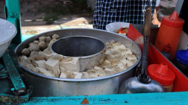  Variation of Meatball or bakso in boiling pan with soup in the center