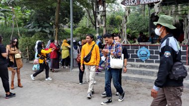 Tourists are looking at Museum Mini Sisa Hartaku (My Remaining Treasure Mini Museum), Yogyakarta, Indonesia July 20, 2022