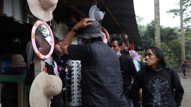 Tourists are looking at Museum Mini Sisa Hartaku (My Remaining Treasure Mini Museum), Yogyakarta, Indonesia July 20, 2022