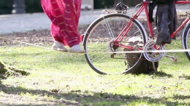 Woman walking on rope — Stock Video