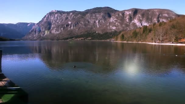 View of Bohinj with lens flare — Stock Video