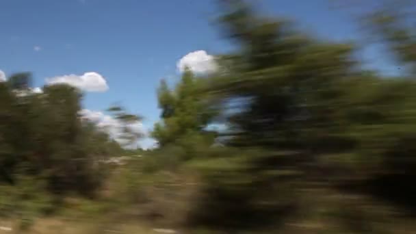 Shot of the landscape near adriatic sea, taken from a driving car. — Stock Video