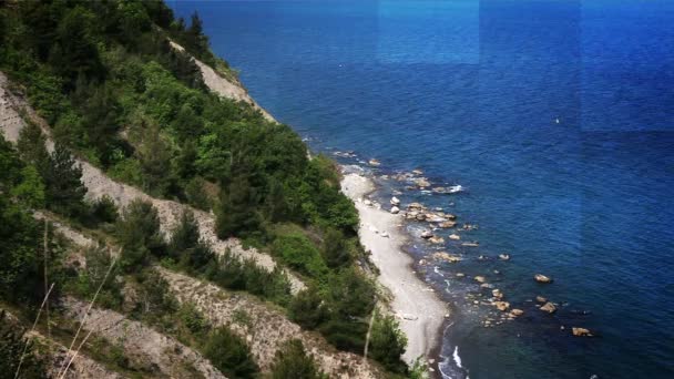 Shot of the cliff near Piran with added mosaic effect — Stock Video