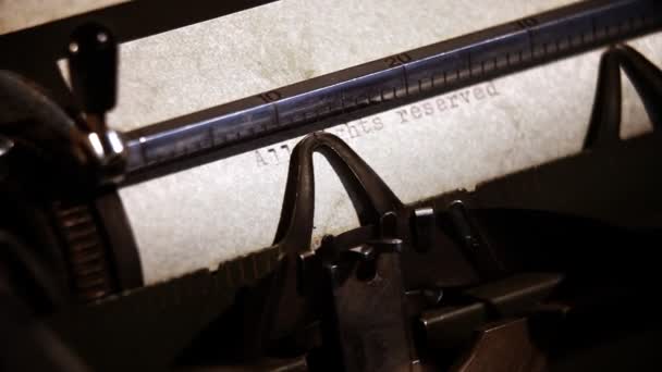 Close up of a typewriter with typed text: All rights reserved — Stock Video