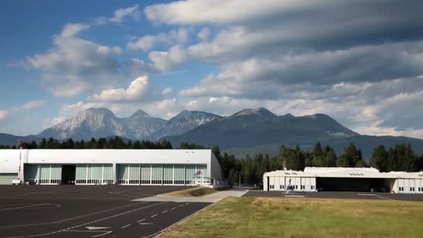 Panorama slide shot of a small airport — Stock Video