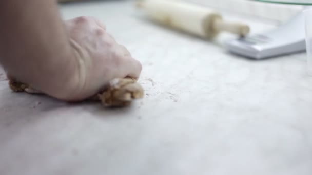 Close up shot of man hands that are making dough for cookies — Stock Video