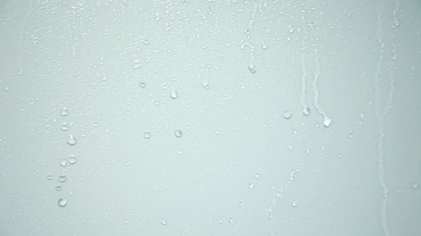 Postřik vodou na sklo sklo — Stock video