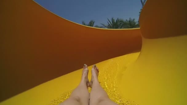 Woman sliding down the waterslide — Stock Video