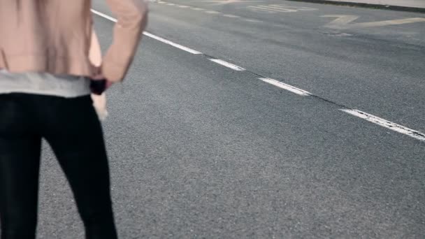 Close up of sexy woman and car passing by — Stock Video