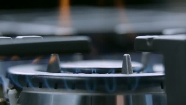 Gas cooker cooktop from close up turning on — Stock Video