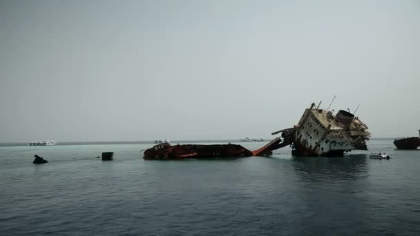 Sightseeing salvaged ship at sea — Stock Video