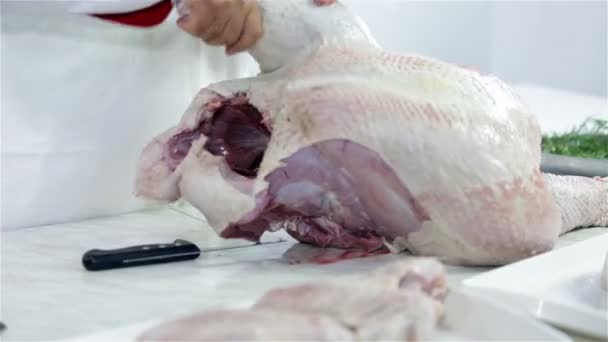 Turkey being cut on butcher desk — Stock Video