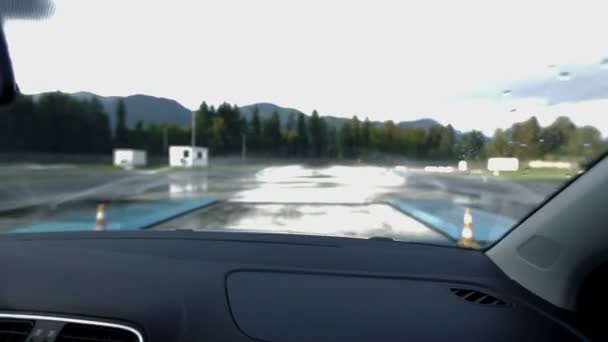 Driving through extreme weather simulation polygon — Stock Video