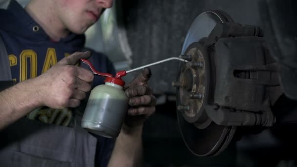 Oiling the elementary part of chassis — Stock Video