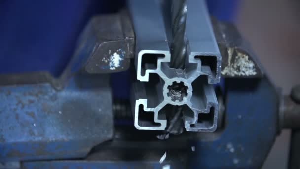 Rilling through iron in close up — Stock Video