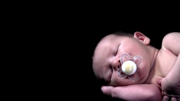 Baby boy sleeping with pacifier — Stock Video