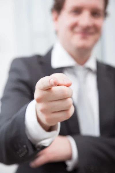 Young businessman pointing — Stock Photo, Image