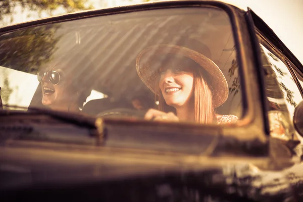 Beautiful woman traveling with her friends — Stock Photo, Image