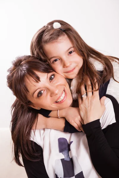 Mother and daughter embracing — Stock Photo, Image