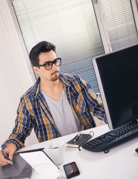 Graphic designer working in office — Stock Photo, Image