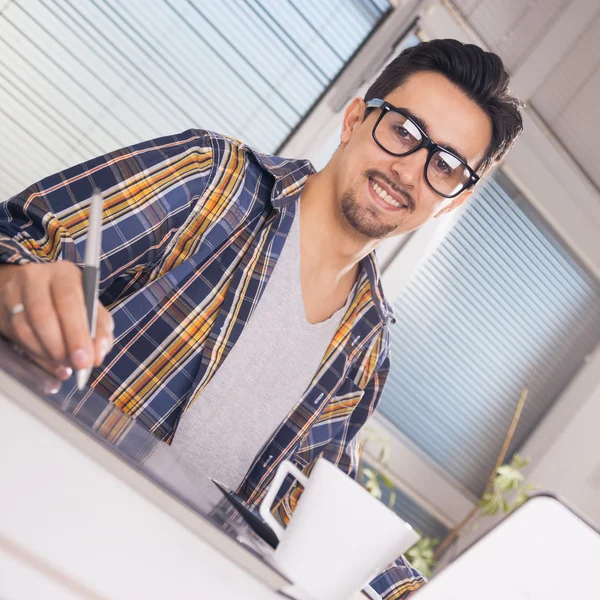 Graphic designer working in office — Stock Photo, Image