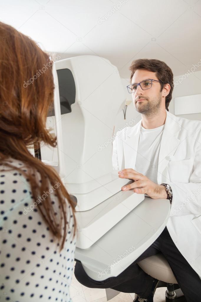 Ophthalmologist With Woman