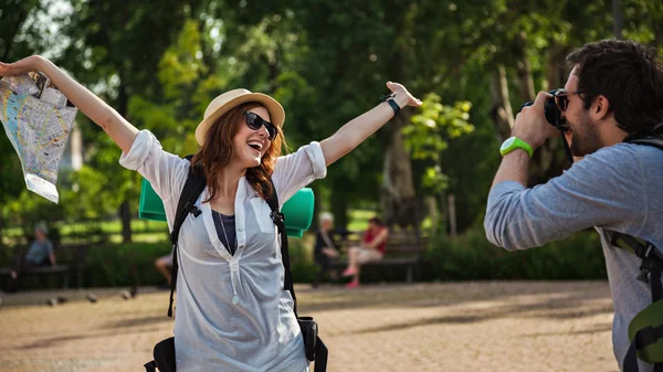 Tourist Couple Taking Photo