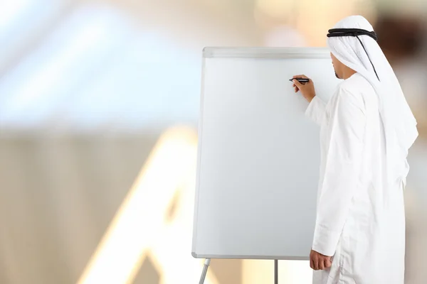 Middle Eastern businessman giving presentation — Stock Photo, Image