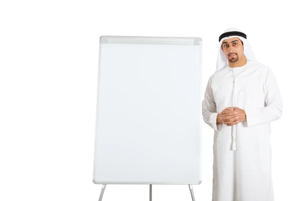 Middle Eastern businessman next to board — Stock Photo, Image