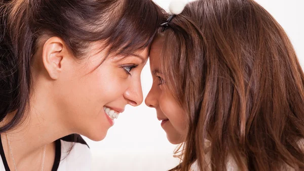 Mother and daughter embracing Stock Picture