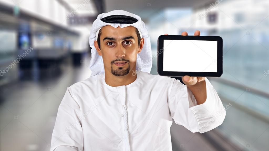 Arab man showing digital tablet