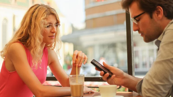 Couple sitting with in cafe — Stock Photo, Image
