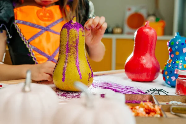 Little Girl Whitch Costume Decorating Pumpkins Glitter Home Idea Halloween — Stock Photo, Image