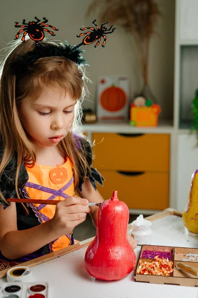 Little Girl Whitch Costume Decorating Pumpkins Glitter Home Idea Halloween — Stock Photo, Image