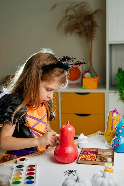 Little Girl Whitch Costume Decorating Pumpkins Glitter Home Idea Halloween — Stock Photo, Image
