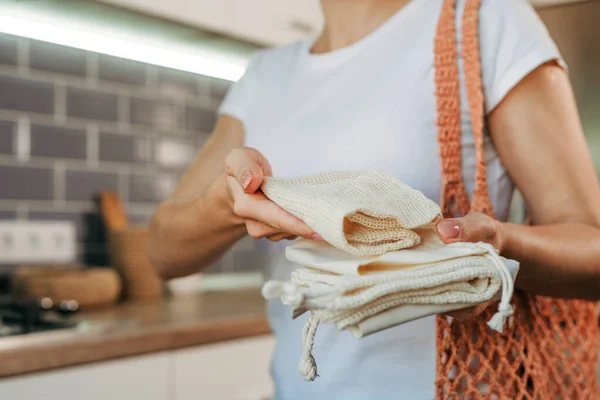 Closeup Young Woman Holding Reusable Cotton Produce Bags Putting Shopper — Stock Fotó