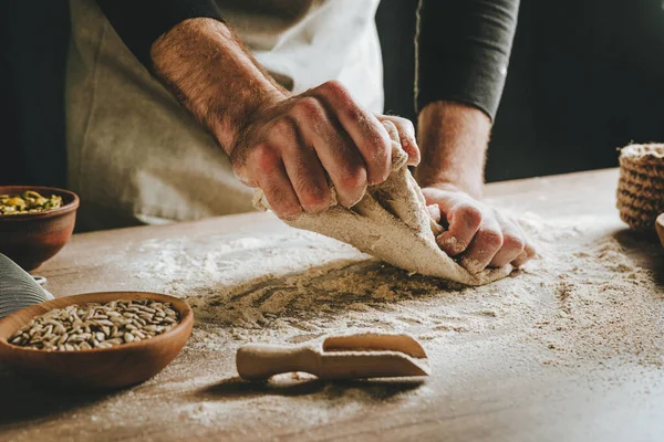 Unrecognizable Young Man Kneading Dough Wooden Table Males Hands Making — Foto de Stock