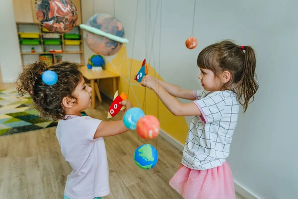 Little Girl Playing Paper Spaceship Learning Solar System Planets Models — Fotografia de Stock