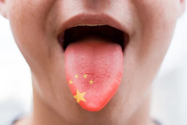 Lengua con la bandera de China —  Fotos de Stock