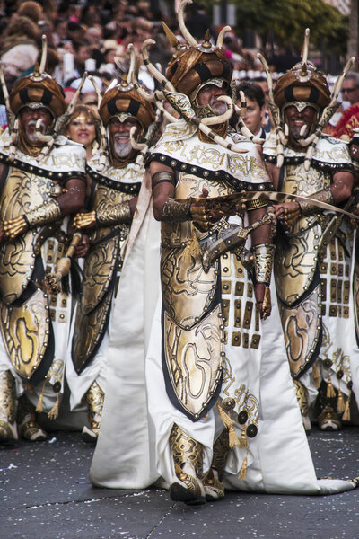 ALCOY, SPAIN - MAY 4: Men wearing moorish costumes marching in a