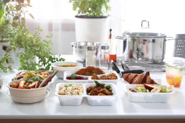 Catering. Balanced diet. The cook prepares healthy diet boxes.