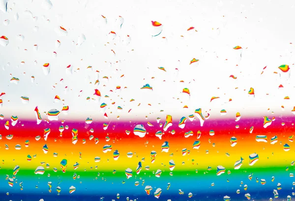 Abstracte Kleurrijke Horizontale Regenboog Achtergrond Met Waterdruppels Een Glas Met — Stockfoto